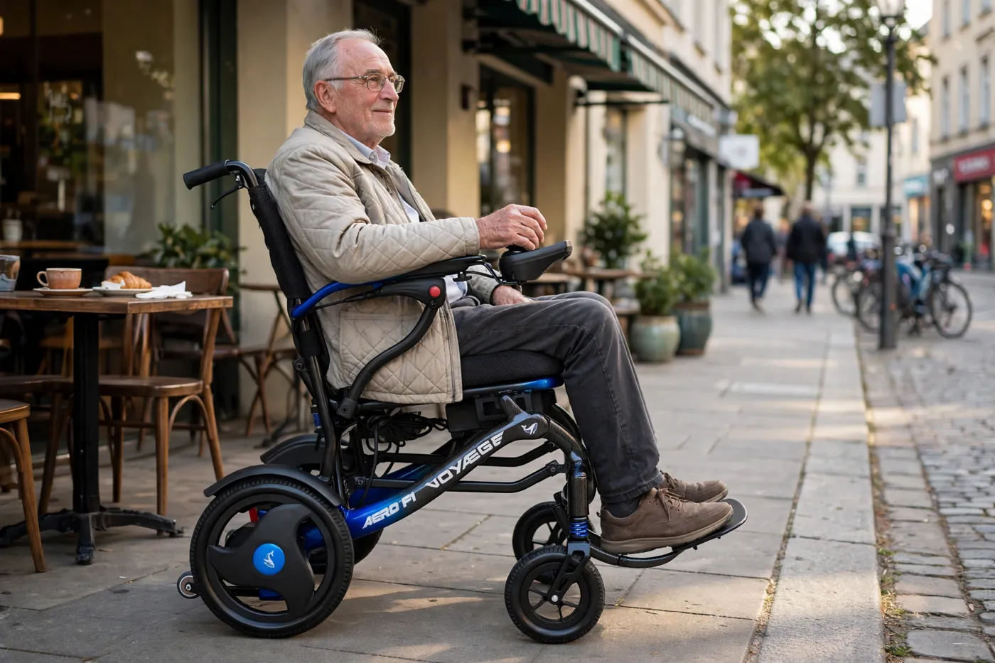 Man riding the Voyaege Aero F1 on a sidewalk outside a cafe